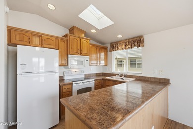 Welcome to this charming single-story manufactured home offering on Viewpoint Golf Resort in Arizona - for sale on GolfHomes.com, golf home, golf lot