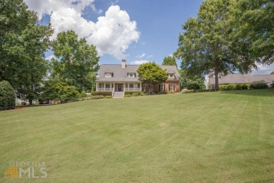 Welcome home! This stunning 3-sided brick 5 bed / 4.5 bath home on Royal Lakes Golf and Country Club in Georgia - for sale on GolfHomes.com, golf home, golf lot
