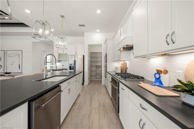 This stunning Stellar Home Plan with breathtaking, picturesque on Valencia Golf and Country Club in Florida - for sale on GolfHomes.com, golf home, golf lot
