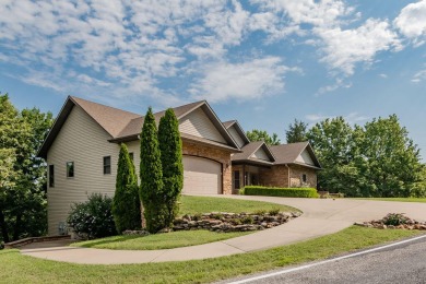 Welcome Home to 217 Commons Court located in StoneBridge Village on Ledgestone Country Club and Golf Course in Missouri - for sale on GolfHomes.com, golf home, golf lot