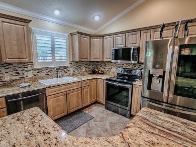 ~oBond is PAID!o~ ~oNEW Roof 5/2025o~ ~oNEW Hot Water Heater on The Links of Spruce Creek in Florida - for sale on GolfHomes.com, golf home, golf lot