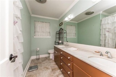 Beautifully renovated 3-bed, 2-bath brick home featuring a 2019 on Pinewood Country Club in Louisiana - for sale on GolfHomes.com, golf home, golf lot