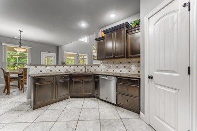 Welcome to 1661 S Coopers Cove in Fayetteville. This 5 bed, 3.5 on Stonebridge Meadows Golf Club in Arkansas - for sale on GolfHomes.com, golf home, golf lot
