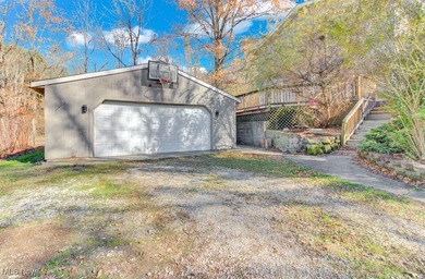 Welcome to this beautifully renovated 3-bedroom, 2-bath gem in on Lake Mohawk Golf Club in Ohio - for sale on GolfHomes.com, golf home, golf lot