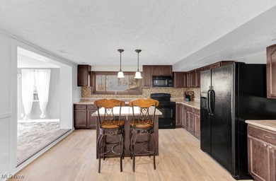 Welcome to this beautifully renovated 3-bedroom, 2-bath gem in on Lake Mohawk Golf Club in Ohio - for sale on GolfHomes.com, golf home, golf lot