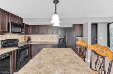 Welcome to this beautifully renovated 3-bedroom, 2-bath gem in on Lake Mohawk Golf Club in Ohio - for sale on GolfHomes.com, golf home, golf lot