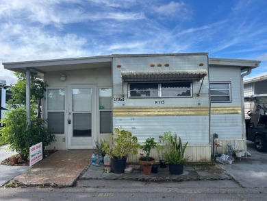 COME AND GRAB THIS DEAL OF A HOME IN THE VERY DESIRABLE ODESSA on Silver Dollar Golf and Trap Club in Florida - for sale on GolfHomes.com, golf home, golf lot