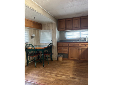 COME AND GRAB THIS DEAL OF A HOME IN THE VERY DESIRABLE ODESSA on Silver Dollar Golf and Trap Club in Florida - for sale on GolfHomes.com, golf home, golf lot