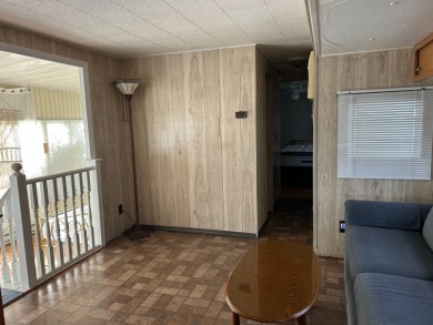 COME AND GRAB THIS DEAL OF A HOME IN THE VERY DESIRABLE ODESSA on Silver Dollar Golf and Trap Club in Florida - for sale on GolfHomes.com, golf home, golf lot