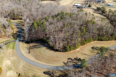 Set within the gated community of Keswick Estate, this elevated on The Keswick Club in Virginia - for sale on GolfHomes.com, golf home, golf lot