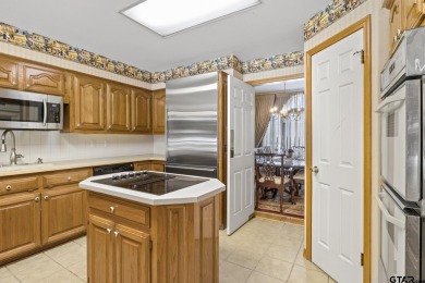 This 4 bedrooms, 3 bathrooms (one is a Jack and Jill) home on Mount Pleasant Country Club in Texas - for sale on GolfHomes.com, golf home, golf lot