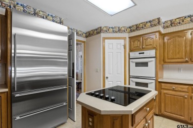This 4 bedrooms, 3 bathrooms (one is a Jack and Jill) home on Mount Pleasant Country Club in Texas - for sale on GolfHomes.com, golf home, golf lot