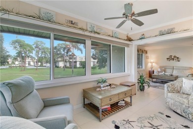 Gorgeous UPDATED Kitchen and Baths. Impact windows and tile on Martin County Golf Course in Florida - for sale on GolfHomes.com, golf home, golf lot