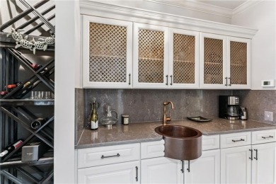 This stunning residence blends timeless European elegance with on Oak Grove Island Golf and Country Club in Georgia - for sale on GolfHomes.com, golf home, golf lot