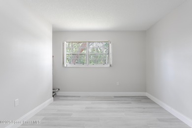 A world of possibility and golf-course living awaits in this on Rockledge Country Club in Florida - for sale on GolfHomes.com, golf home, golf lot