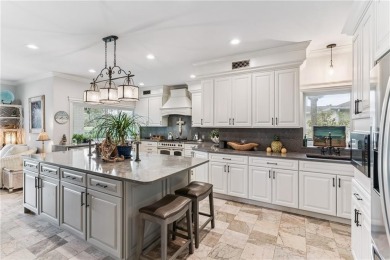 This stunning residence blends timeless European elegance with on Oak Grove Island Golf and Country Club in Georgia - for sale on GolfHomes.com, golf home, golf lot