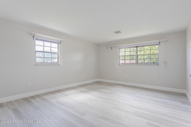 A world of possibility and golf-course living awaits in this on Rockledge Country Club in Florida - for sale on GolfHomes.com, golf home, golf lot