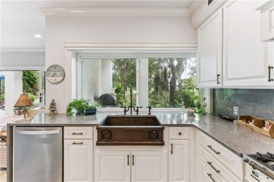This stunning residence blends timeless European elegance with on Oak Grove Island Golf and Country Club in Georgia - for sale on GolfHomes.com, golf home, golf lot