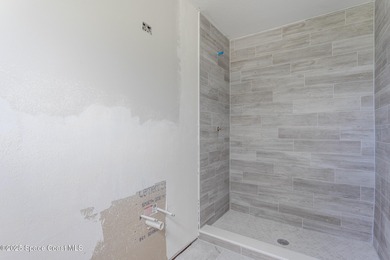 A world of possibility and golf-course living awaits in this on Rockledge Country Club in Florida - for sale on GolfHomes.com, golf home, golf lot