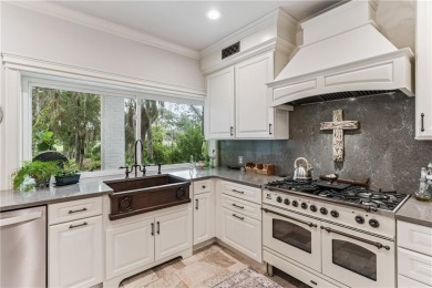 This stunning residence blends timeless European elegance with on Oak Grove Island Golf and Country Club in Georgia - for sale on GolfHomes.com, golf home, golf lot