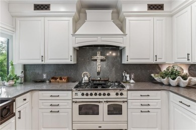 This stunning residence blends timeless European elegance with on Oak Grove Island Golf and Country Club in Georgia - for sale on GolfHomes.com, golf home, golf lot