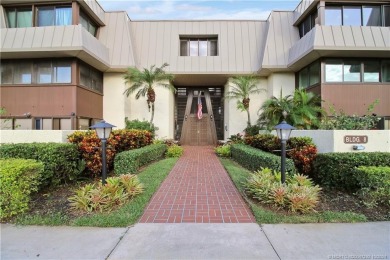 Gorgeous UPDATED Kitchen and Baths. Impact windows and tile on Martin County Golf Course in Florida - for sale on GolfHomes.com, golf home, golf lot