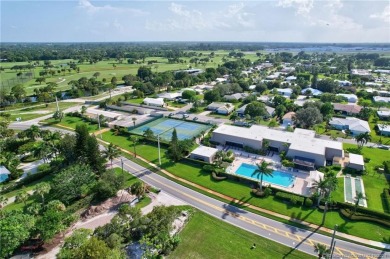 Gorgeous UPDATED Kitchen and Baths. Impact windows and tile on Martin County Golf Course in Florida - for sale on GolfHomes.com, golf home, golf lot