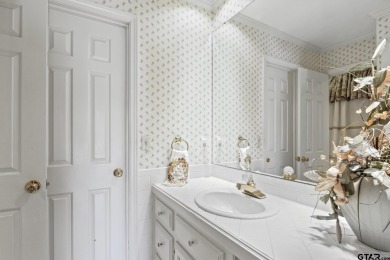 This 4 bedrooms, 3 bathrooms (one is a Jack and Jill) home on Mount Pleasant Country Club in Texas - for sale on GolfHomes.com, golf home, golf lot