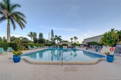 Gorgeous UPDATED Kitchen and Baths. Impact windows and tile on Martin County Golf Course in Florida - for sale on GolfHomes.com, golf home, golf lot