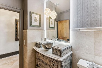This stunning residence blends timeless European elegance with on Oak Grove Island Golf and Country Club in Georgia - for sale on GolfHomes.com, golf home, golf lot