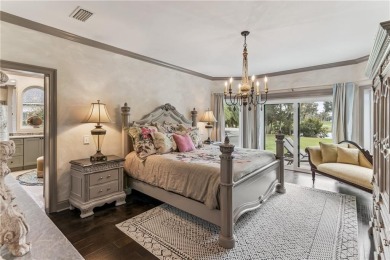 This stunning residence blends timeless European elegance with on Oak Grove Island Golf and Country Club in Georgia - for sale on GolfHomes.com, golf home, golf lot