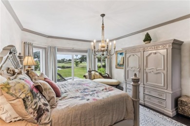 This stunning residence blends timeless European elegance with on Oak Grove Island Golf and Country Club in Georgia - for sale on GolfHomes.com, golf home, golf lot
