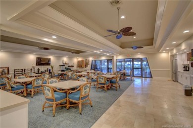 Gorgeous UPDATED Kitchen and Baths. Impact windows and tile on Martin County Golf Course in Florida - for sale on GolfHomes.com, golf home, golf lot