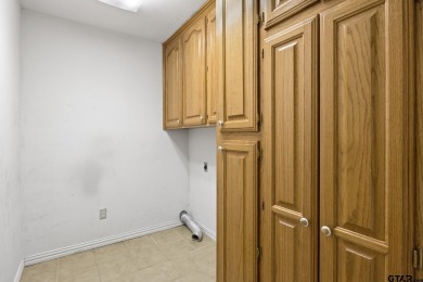 This 4 bedrooms, 3 bathrooms (one is a Jack and Jill) home on Mount Pleasant Country Club in Texas - for sale on GolfHomes.com, golf home, golf lot