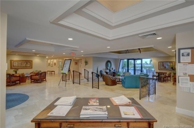 Gorgeous UPDATED Kitchen and Baths. Impact windows and tile on Martin County Golf Course in Florida - for sale on GolfHomes.com, golf home, golf lot