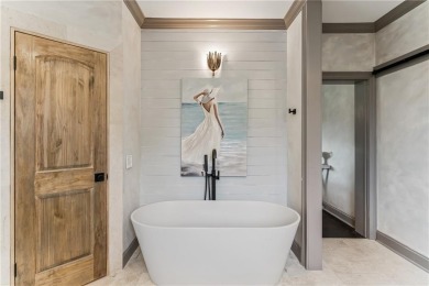 This stunning residence blends timeless European elegance with on Oak Grove Island Golf and Country Club in Georgia - for sale on GolfHomes.com, golf home, golf lot