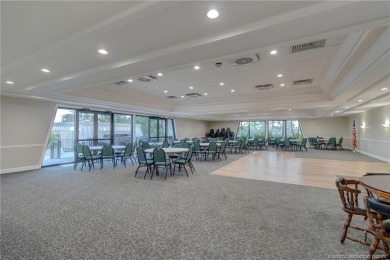 Gorgeous UPDATED Kitchen and Baths. Impact windows and tile on Martin County Golf Course in Florida - for sale on GolfHomes.com, golf home, golf lot