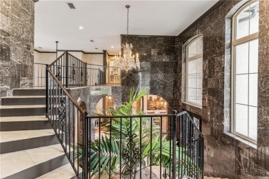 This stunning residence blends timeless European elegance with on Oak Grove Island Golf and Country Club in Georgia - for sale on GolfHomes.com, golf home, golf lot