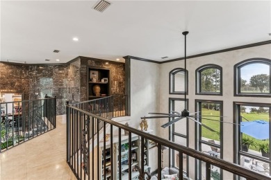 This stunning residence blends timeless European elegance with on Oak Grove Island Golf and Country Club in Georgia - for sale on GolfHomes.com, golf home, golf lot