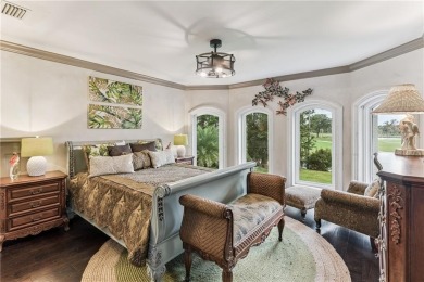 This stunning residence blends timeless European elegance with on Oak Grove Island Golf and Country Club in Georgia - for sale on GolfHomes.com, golf home, golf lot