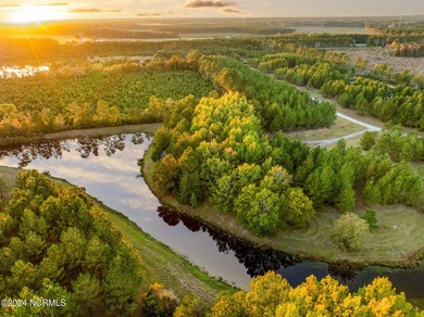 This large 0.65 acre wooded estate homesite is located in ''The on River Landing Golf Course in North Carolina - for sale on GolfHomes.com, golf home, golf lot