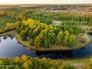 This large 0.65 acre wooded estate homesite is located in ''The on River Landing Golf Course in North Carolina - for sale on GolfHomes.com, golf home, golf lot