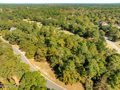 This 0.60 acre wooded residential home site is located in ''The on River Landing Golf Course in North Carolina - for sale on GolfHomes.com, golf home, golf lot