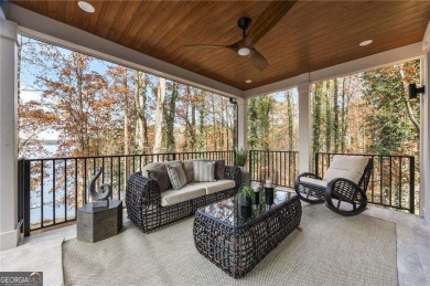 This stunning lakefront home on Lake Lanier offers effortless on Lanier Island Legacy Golf Couorse in Georgia - for sale on GolfHomes.com, golf home, golf lot