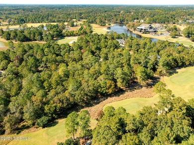 This 0.60 acre wooded residential home site is located in ''The on River Landing Golf Course in North Carolina - for sale on GolfHomes.com, golf home, golf lot