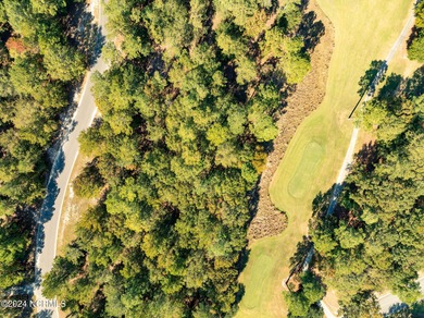 This 0.60 acre wooded residential home site is located in ''The on River Landing Golf Course in North Carolina - for sale on GolfHomes.com, golf home, golf lot
