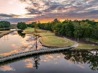 This .47 acre wooded residential homesite is in The Maple Creek on River Landing Golf Course in North Carolina - for sale on GolfHomes.com, golf home, golf lot