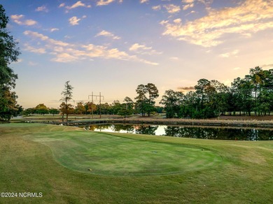 This .47 acre wooded residential homesite is in The Maple Creek on River Landing Golf Course in North Carolina - for sale on GolfHomes.com, golf home, golf lot