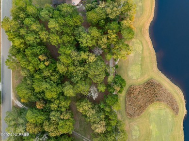 This .47 acre wooded residential homesite is in The Maple Creek on River Landing Golf Course in North Carolina - for sale on GolfHomes.com, golf home, golf lot