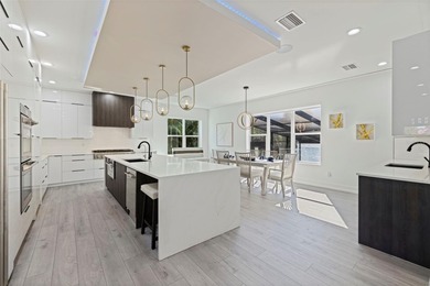 This exceptional waterfront residence, built in 2023, delivers a on The Renaisssance Vinoy Golf Club in Florida - for sale on GolfHomes.com, golf home, golf lot